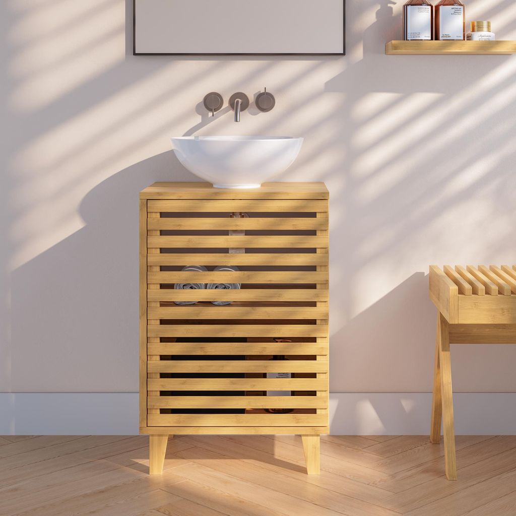 A bathroom vanity with a sink and cabinet.