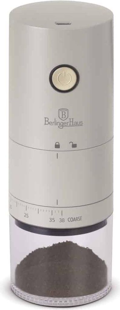A portable coffee grinder with a clear container at the bottom filled with ground coffee.