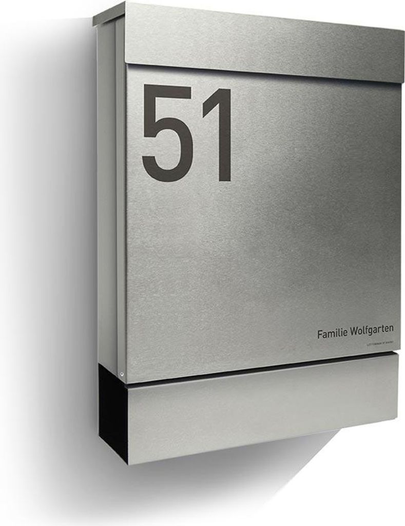 A modern, brushed stainless steel mailbox with the number 51 prominently displayed on the front.