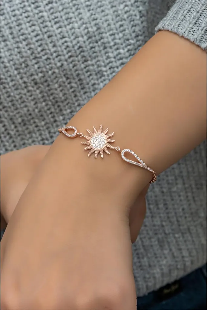 Bracelet en argent femme avec motif soleil en or rose et oxydes de zirconium