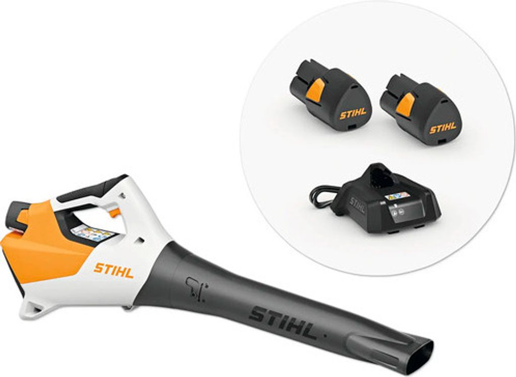A Stihl leaf blower with two batteries and a charger.