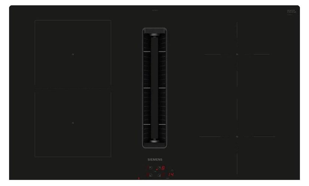 A top-down view of a black induction cooktop with an integrated ventilation system.