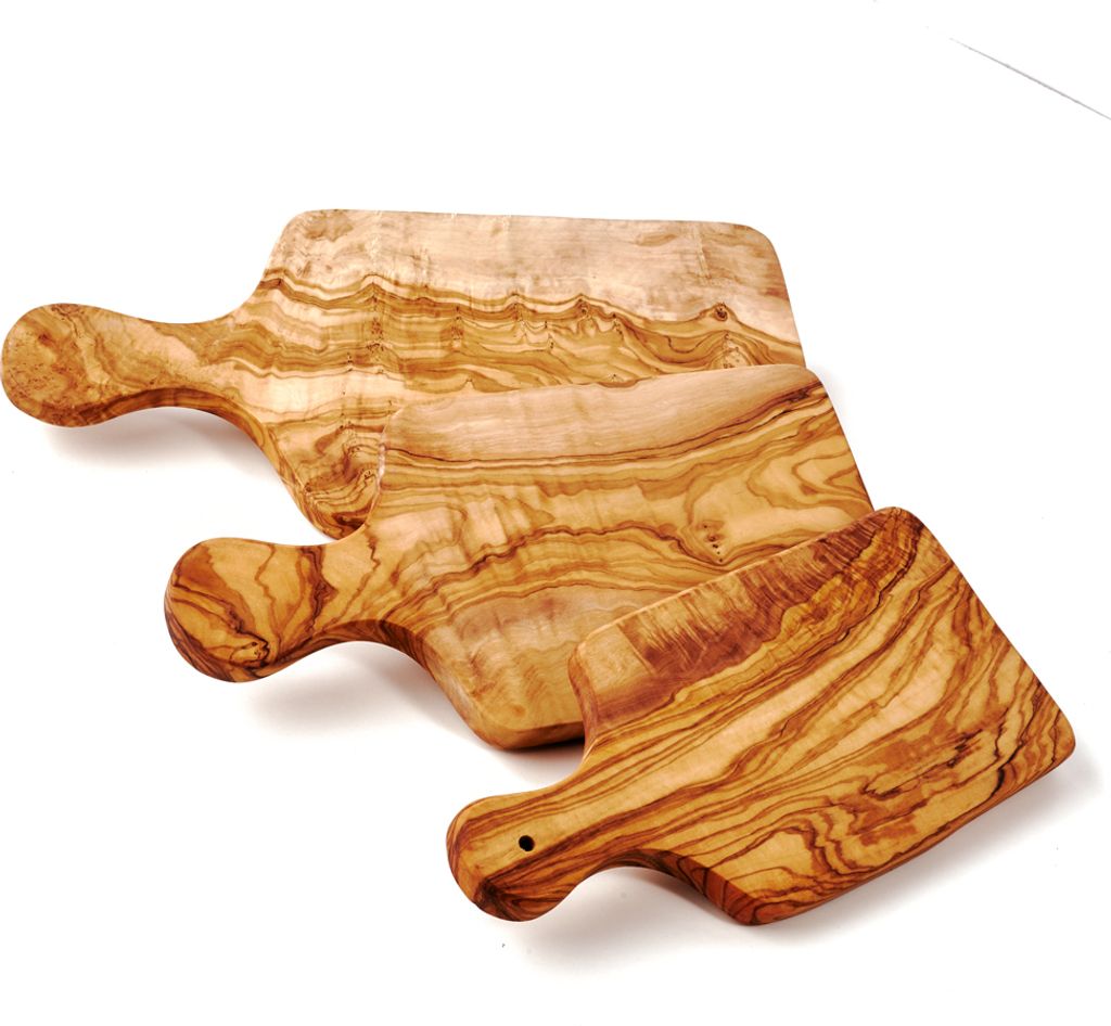 Three wooden cutting boards of different sizes are arranged diagonally on a white background.