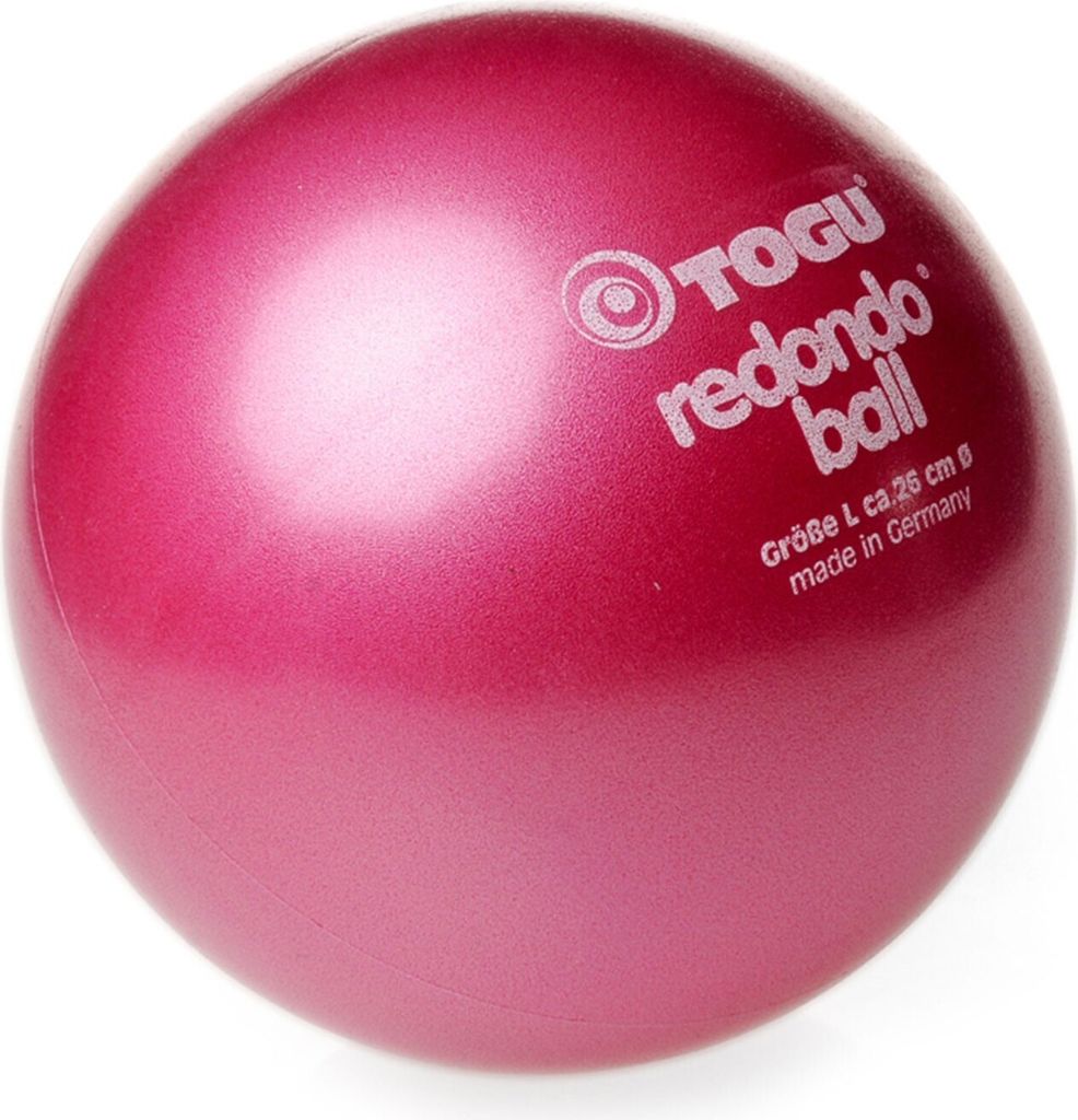 A close-up studio shot of a pink Togu Redondo ball.
