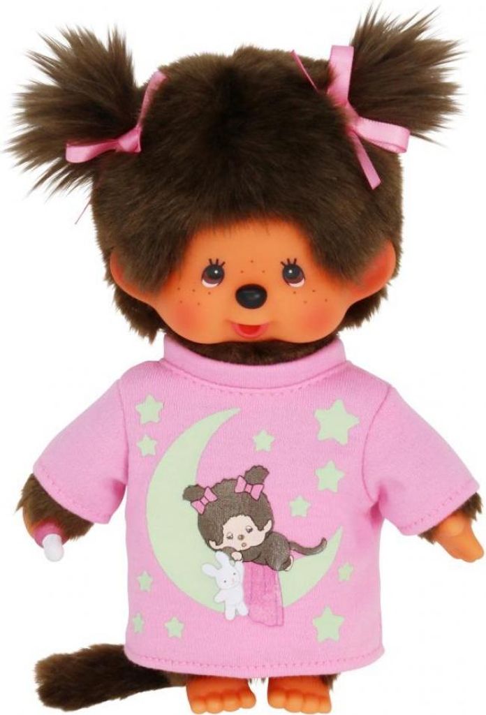 A plush toy Monchhichi doll wearing a pink pajama shirt with a moon and stars design.