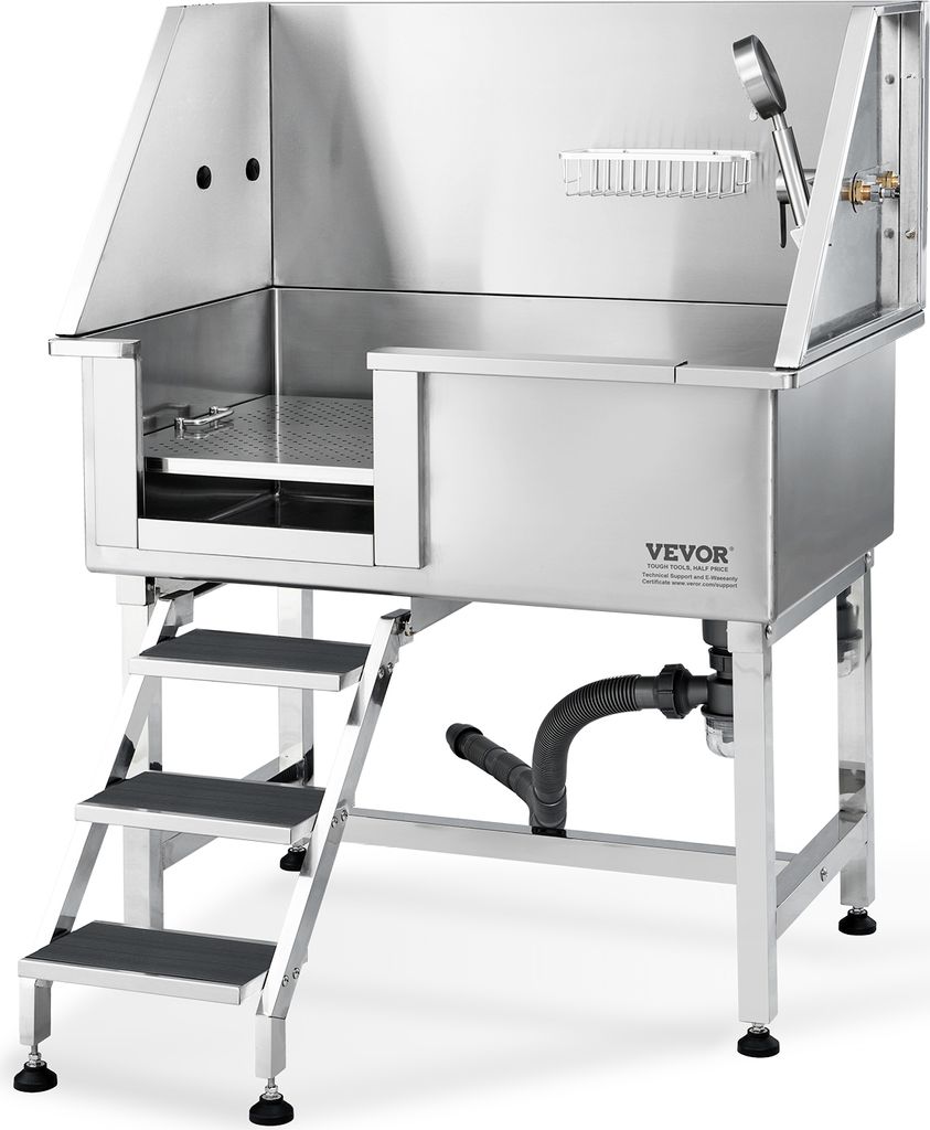 A stainless steel dog grooming tub with attached steps and plumbing.