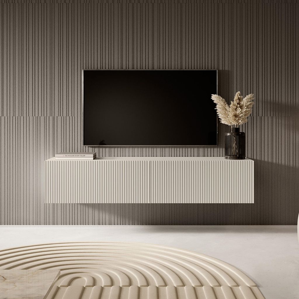 A modern TV stand with a TV mounted above it, in a minimalist room setting.