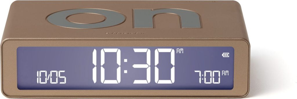 A close-up studio shot of a digital alarm clock.