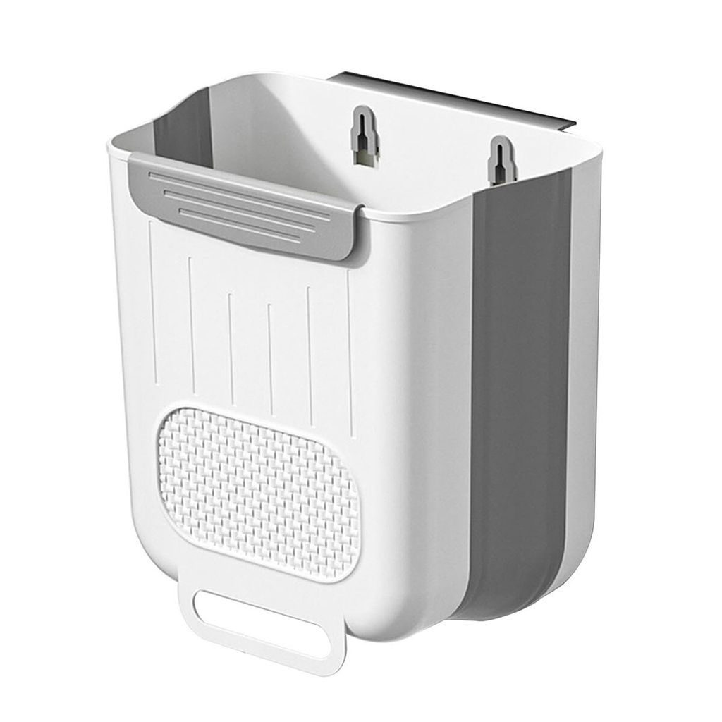 A white and gray collapsible trash can is shown hanging on a wall.