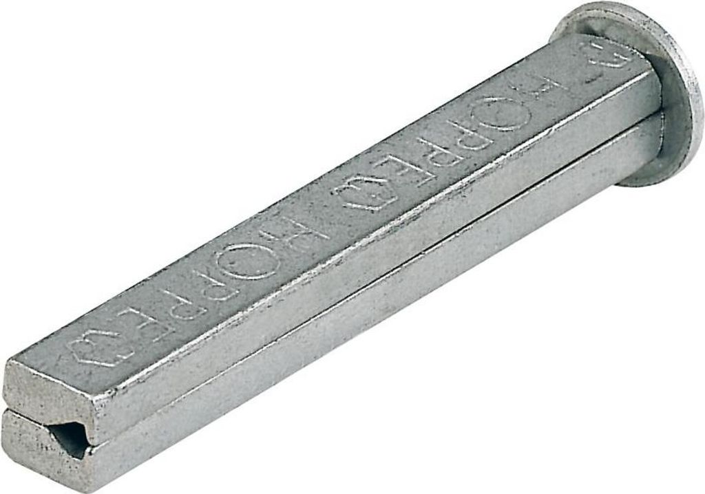 A silver-colored metal object with text embossed on it, lying on a white background.