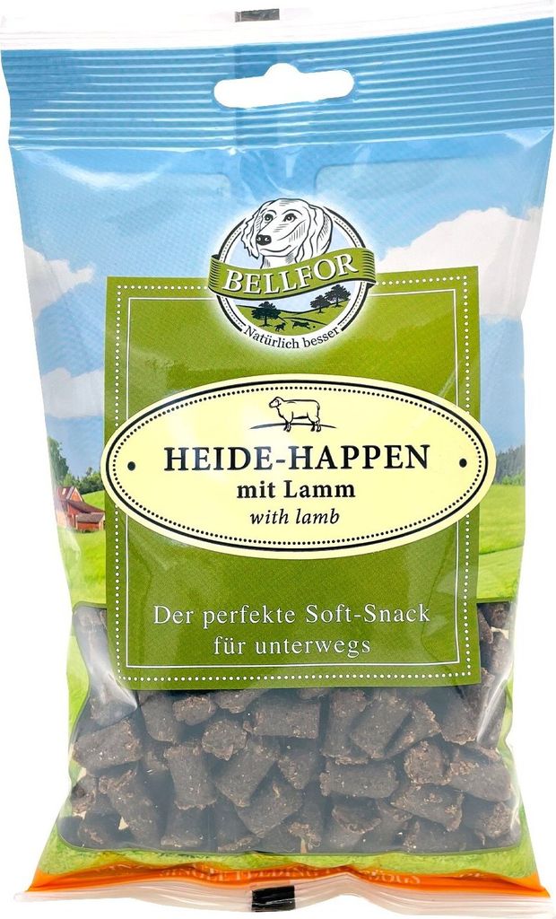 A bag of dog treats with a landscape background.