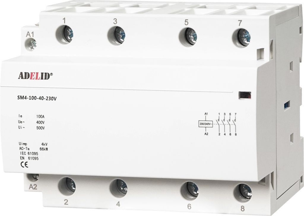 A white electrical contactor with labeling and connection terminals.