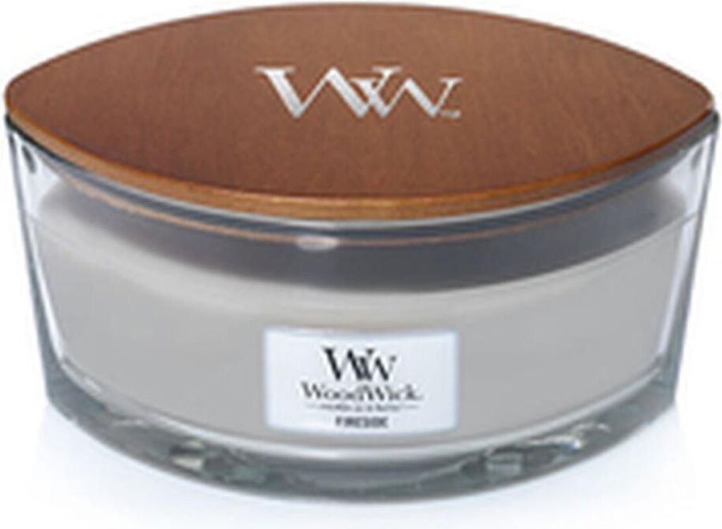 A WoodWick candle in a glass jar with a wooden lid.