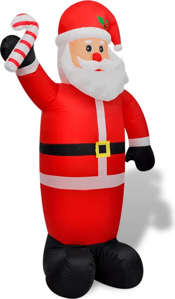 An inflatable Santa Claus figure holding a candy cane.