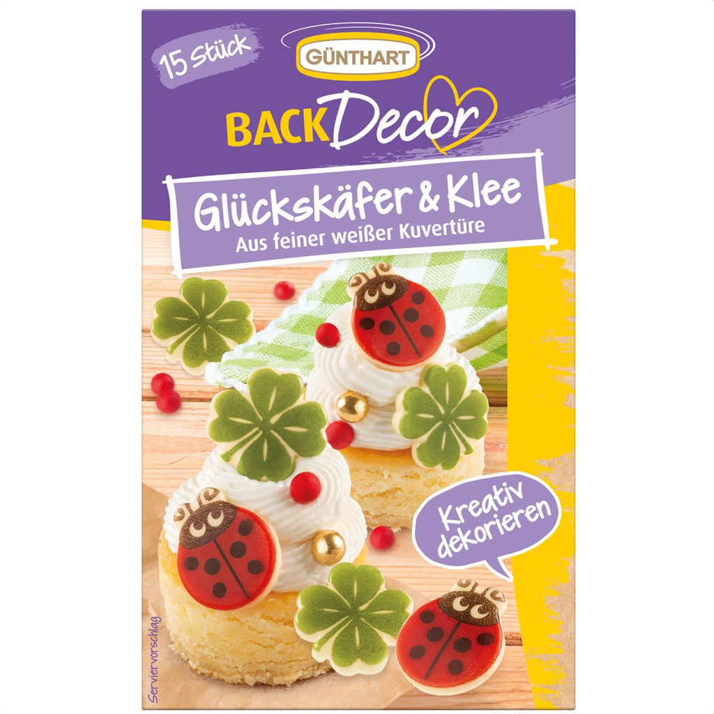 Product packaging for baking decorations, showing examples of decorated cakes.