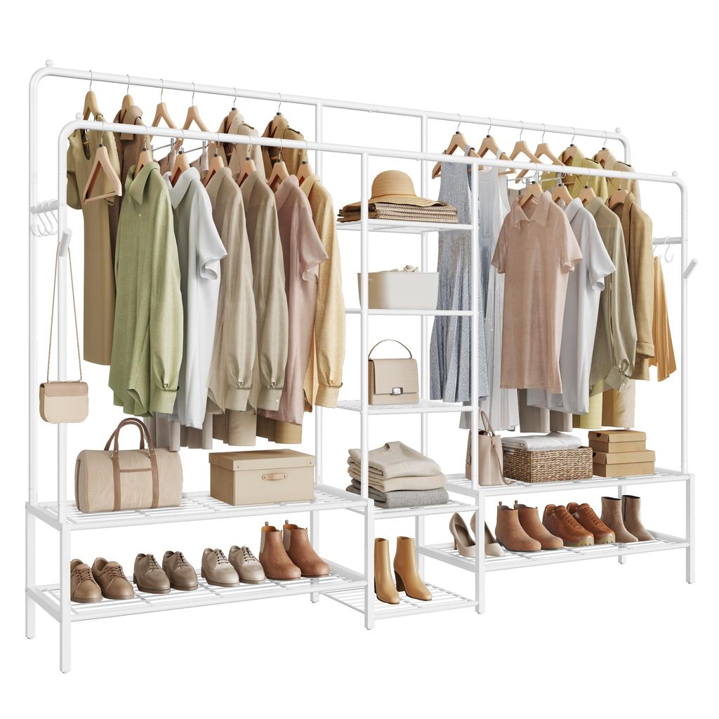 A white garment rack filled with clothes and accessories, with shelves for shoes and storage boxes.