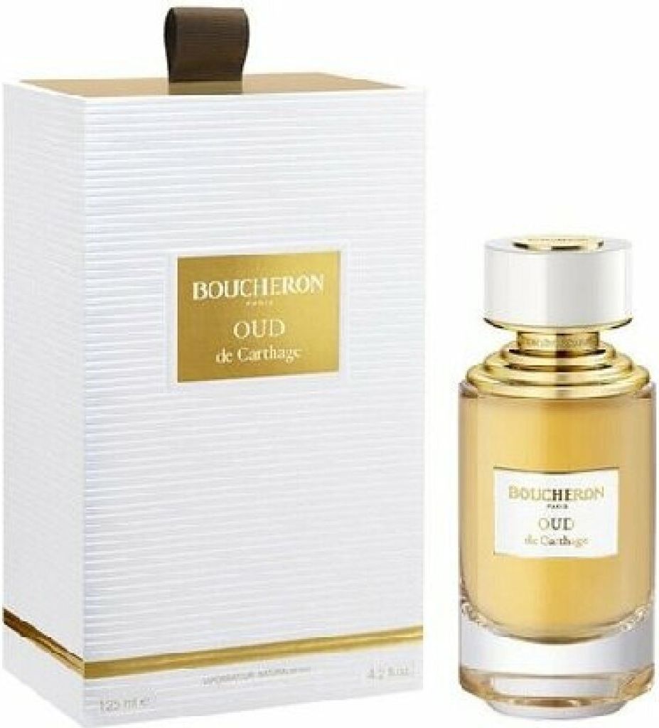 A perfume bottle and its packaging are displayed against a white background.