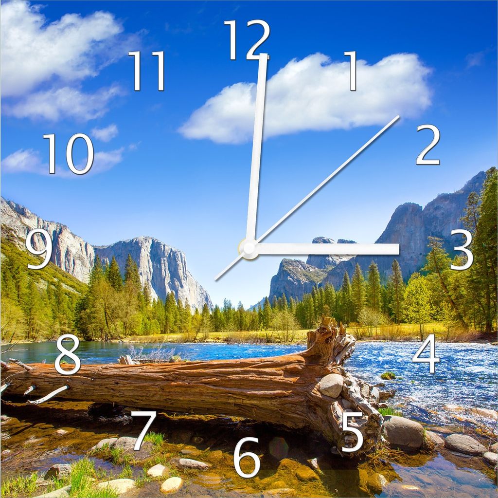 Wallario Design Wanduhr Baumstamm im Fluss zwischen Bergen Produktbild 