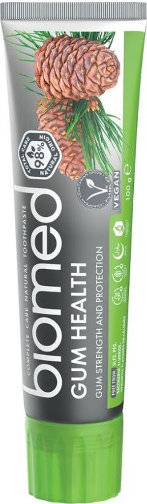 A tube of toothpaste with pine cones and needles on the packaging.