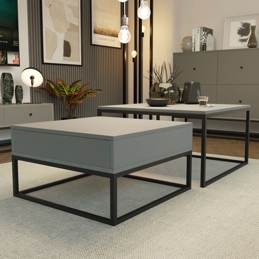 A modern living room setting with two coffee tables, decorative items, and artwork.