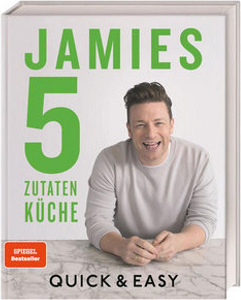 A cookbook cover featuring a chef.