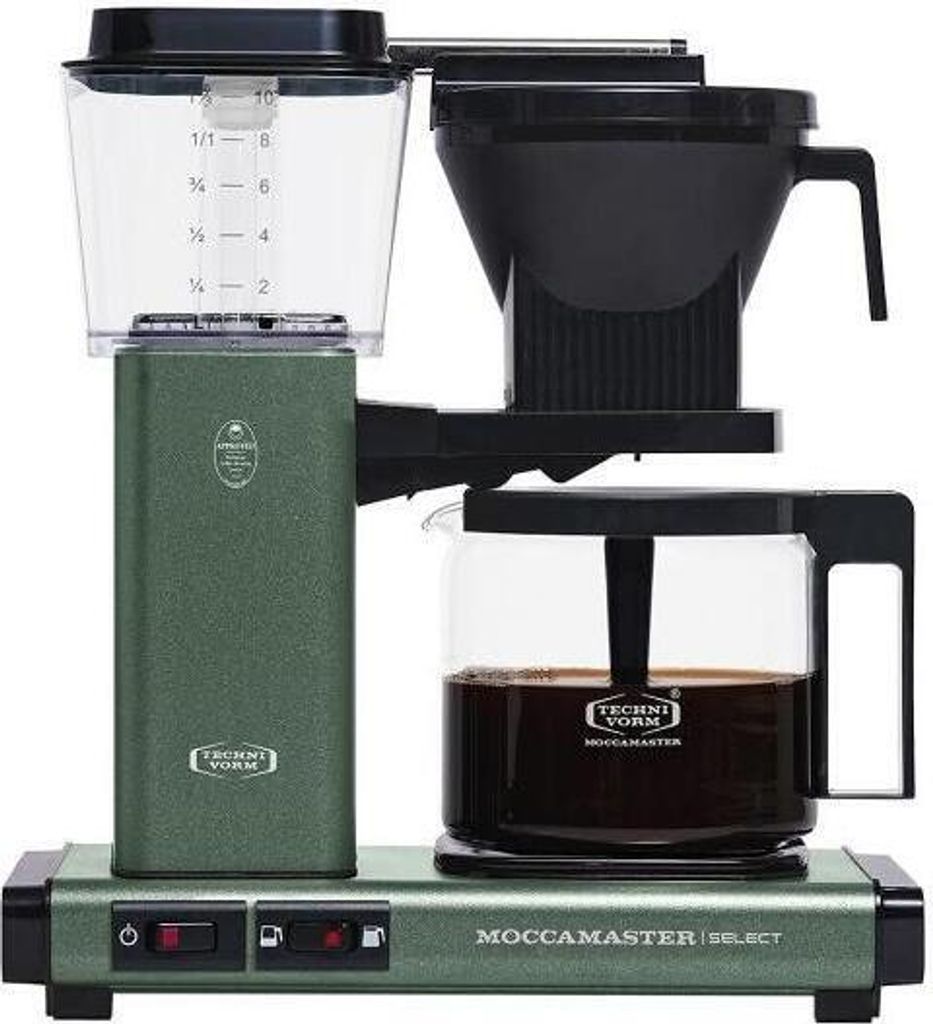 A close-up shot of a green Technivorm Moccamaster coffee maker with a glass carafe full of coffee.