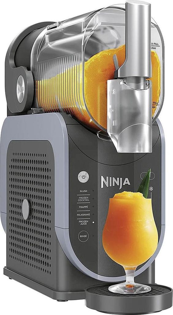 A Ninja brand slushie maker with a frozen drink in a glass.