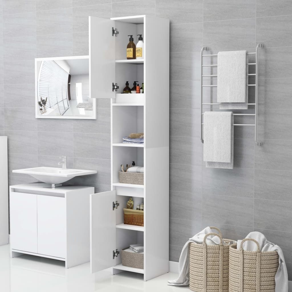 A white bathroom cabinet with open doors, displaying shelves with toiletries and baskets, next to a sink and mirror.