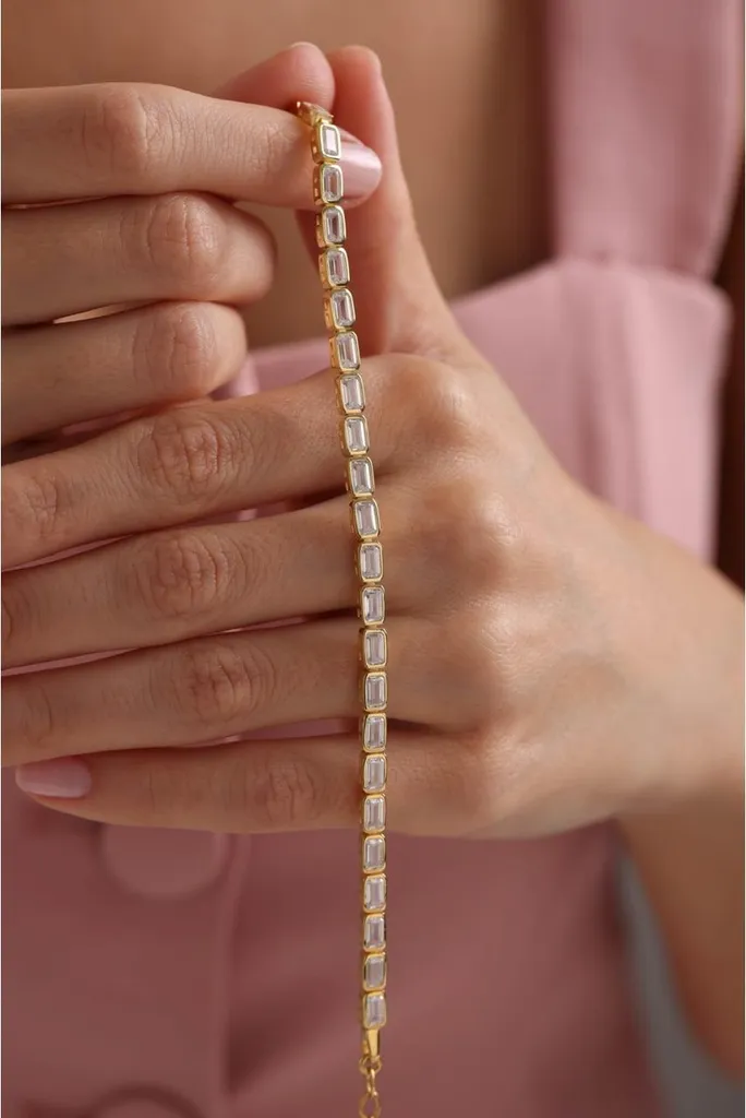Bracelet ajustable argent 925 doré serti de zircons baguettes éclatants