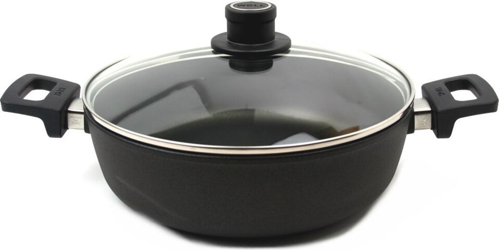 A black frying pan with a glass lid and silver handles is shown against a white background.