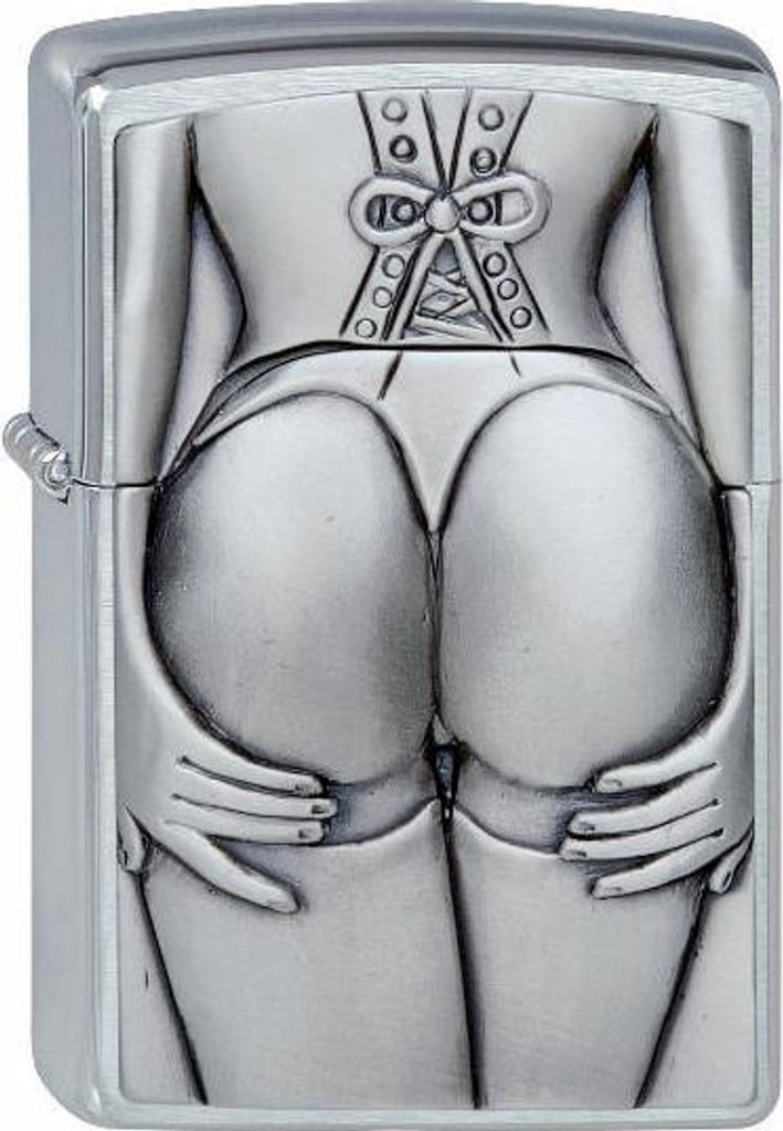 A close-up, front-facing view of a Zippo lighter with an embossed design of a woman's posterior in lingerie.