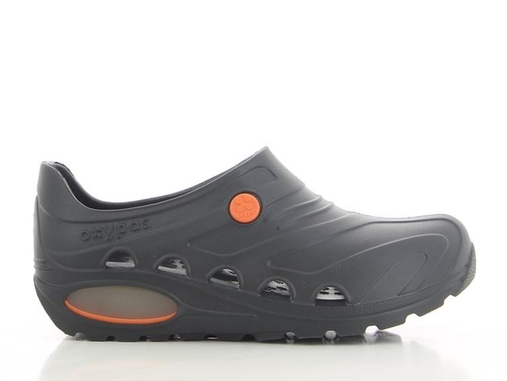 A single dark gray shoe with orange accents is shown against a white background.