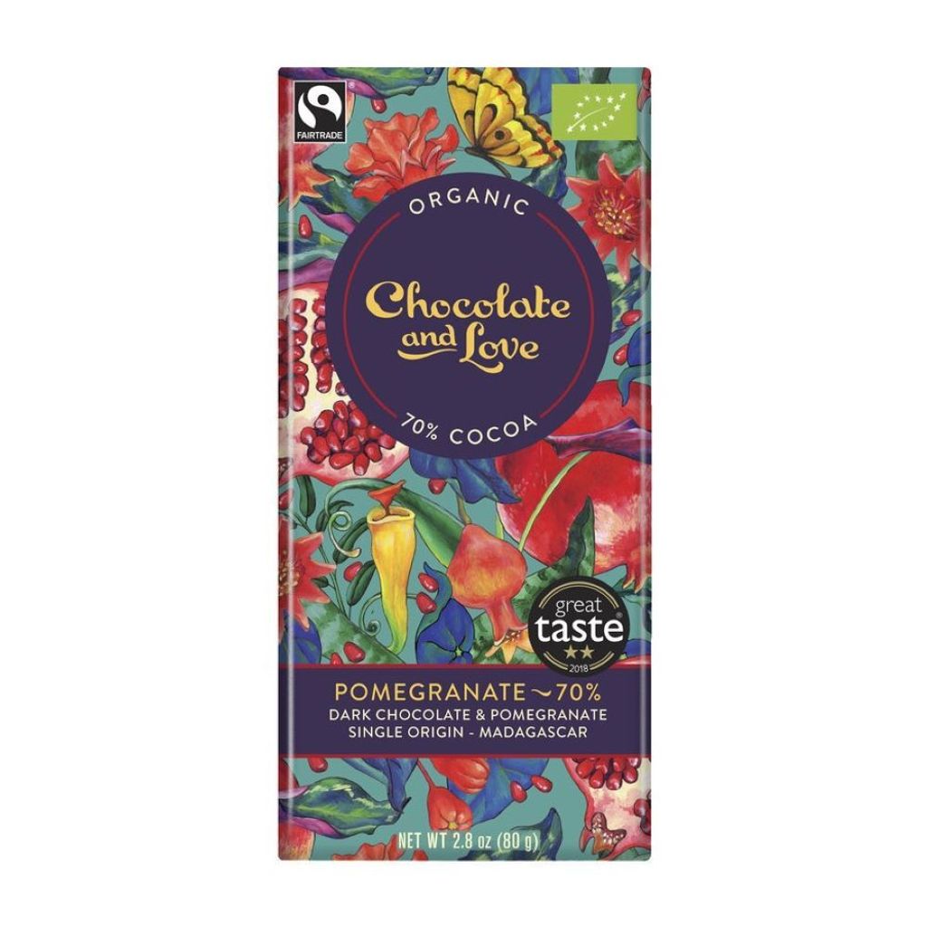 A bar of dark chocolate with a colorful, floral, and butterfly-themed wrapper.