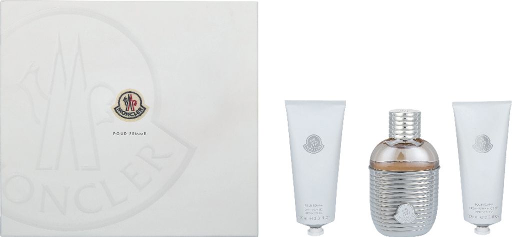 A product shot of a Moncler fragrance set, including a gift box and three individual perfume bottles/tubes.