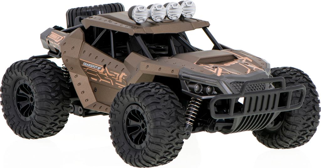 A brown off-road RC car with large tires and four headlights on the roof, shown from a front-side angle against a white background.