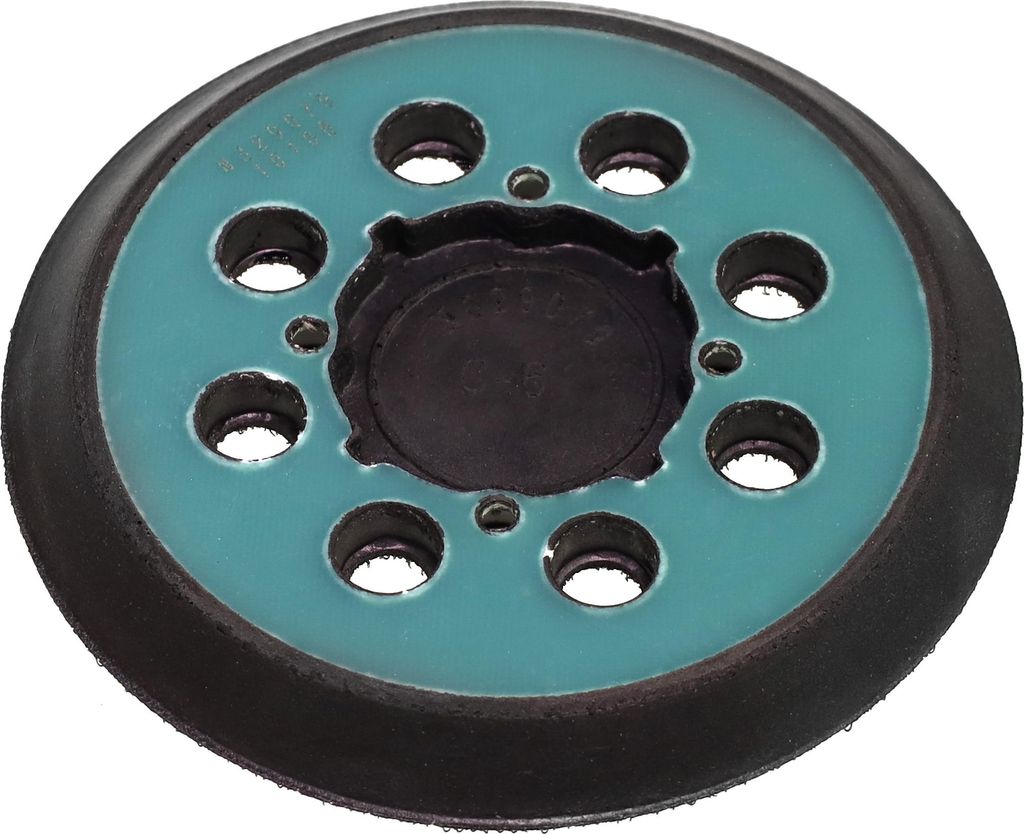 A close-up, top-down view of a sanding pad.
