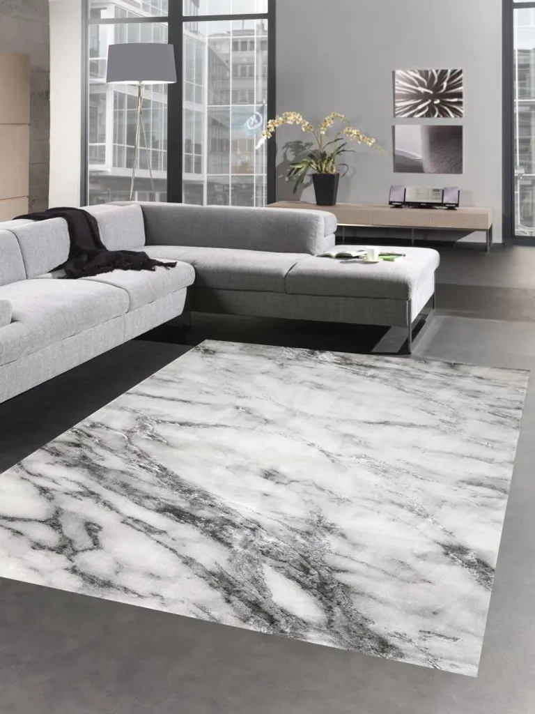 Tapis rond 160 cm aspect marbre : le confort textile sans la froideur