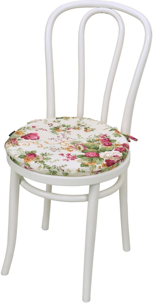 A white chair with a floral cushion.