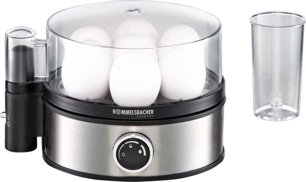 A product shot of an egg cooker with a measuring cup.