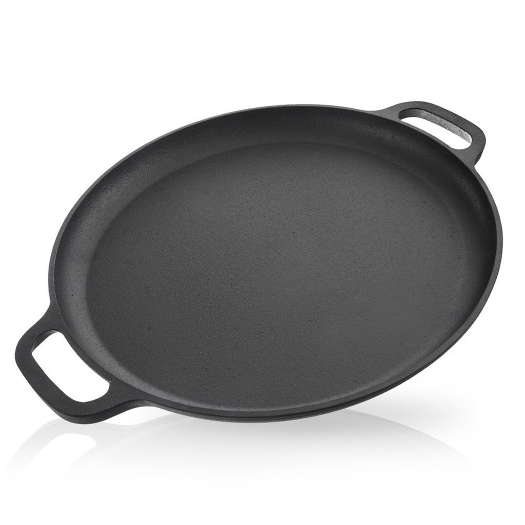 A black cast iron pan with two handles is shown from a slightly elevated angle against a white background.