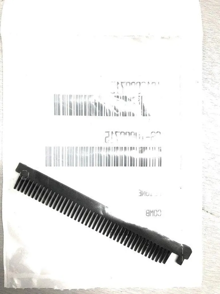 Accessoire de coiffure : Peigne amovible pour plaques à lisser 1 pce