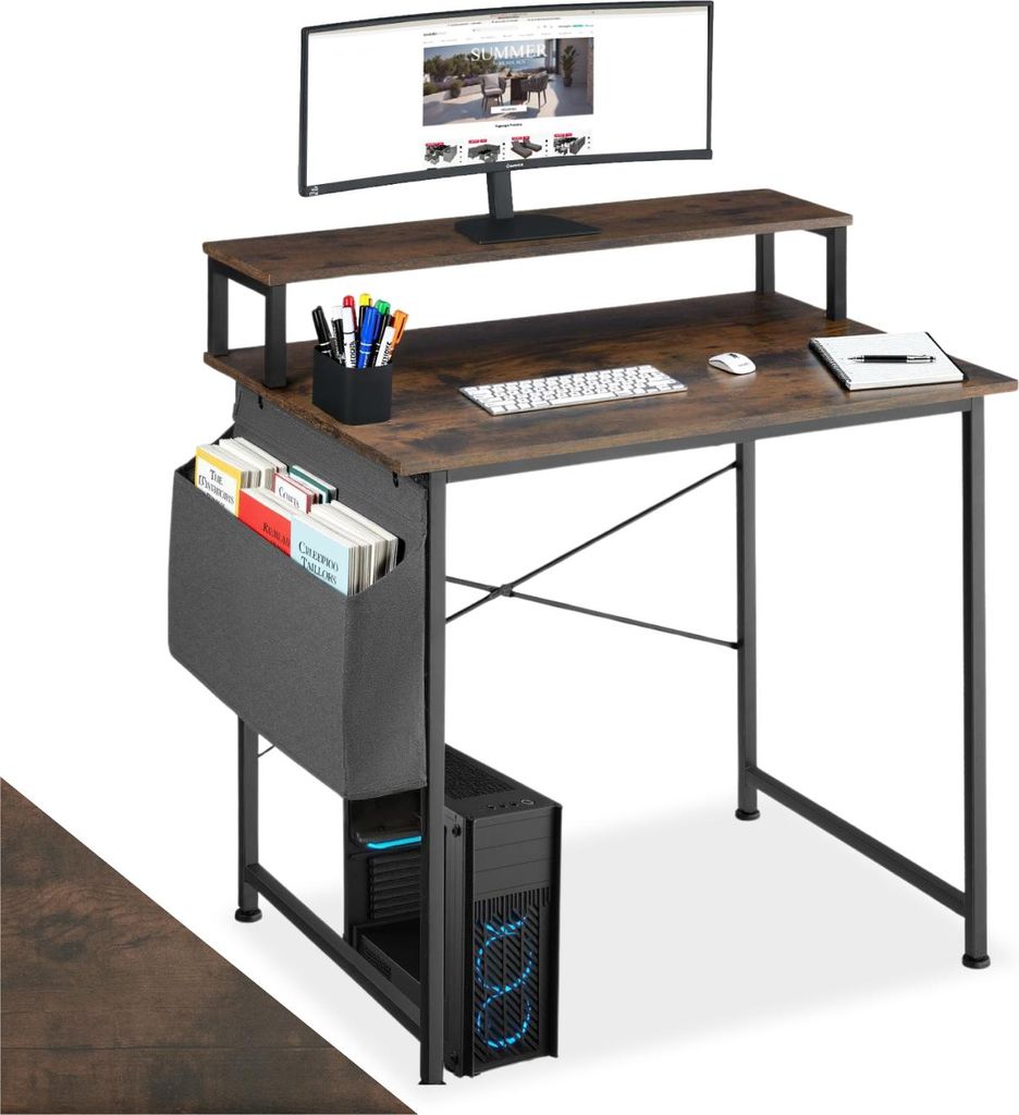 A computer desk with a monitor, keyboard, mouse, and storage.