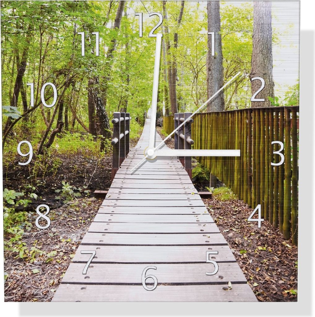 Wallario Design Wanduhr Spaziergang im Wald Holzweg über einen Fluss aus Aluverbund, Größe 30 x 30 cm
