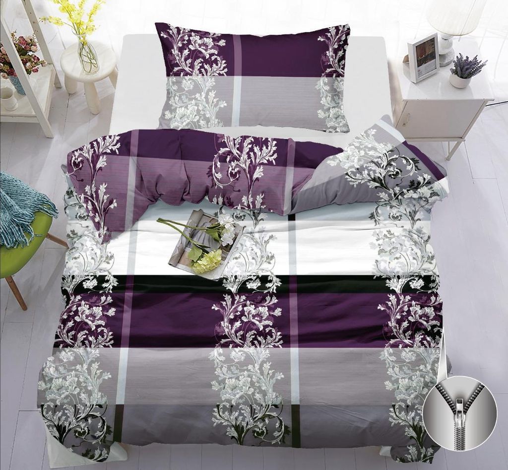 A neatly made bed with a duvet cover and pillow, styled with a small book and flowers.