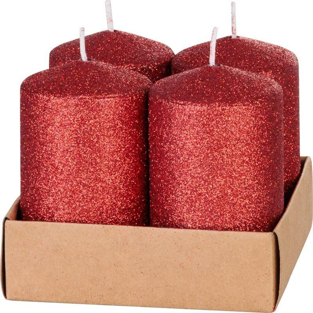 Four red glitter candles in a cardboard box.