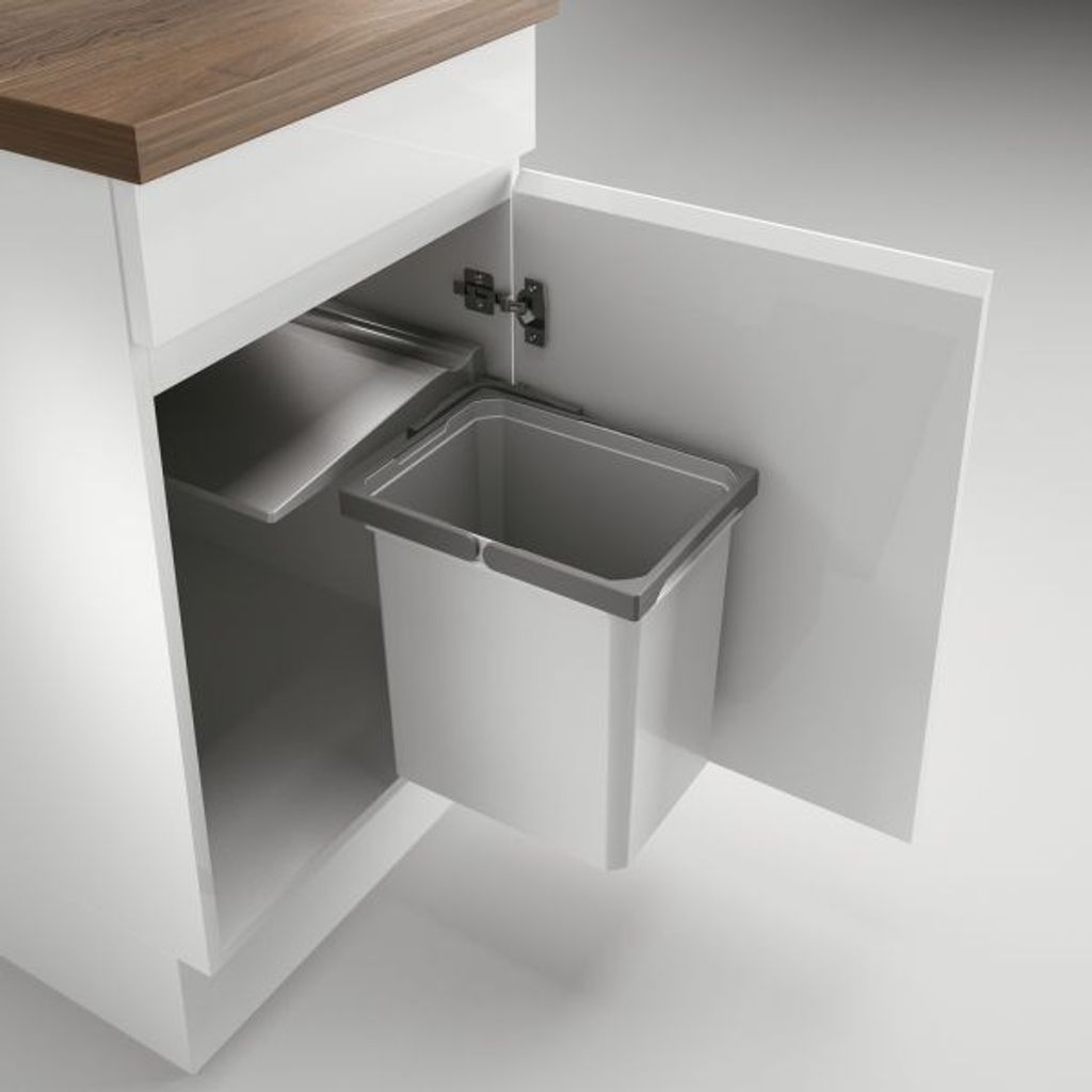 A pull-out trash bin system installed in a kitchen cabinet.