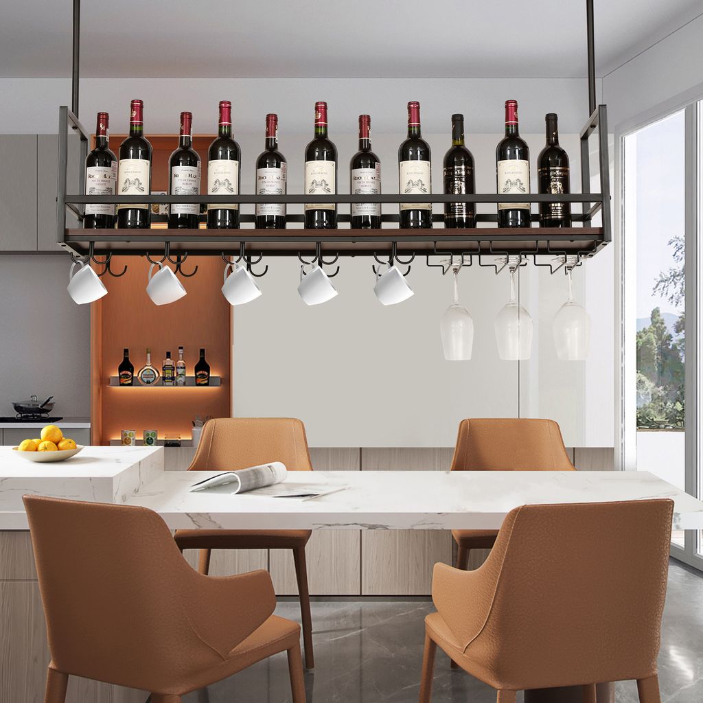 A modern dining room with a wine rack hanging above a marble-topped table.