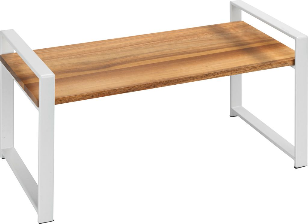 A shelf unit with a wooden top and white metal frame.