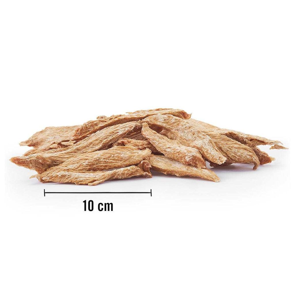 A pile of dried meat strips for dogs, with a ruler indicating 10 cm.