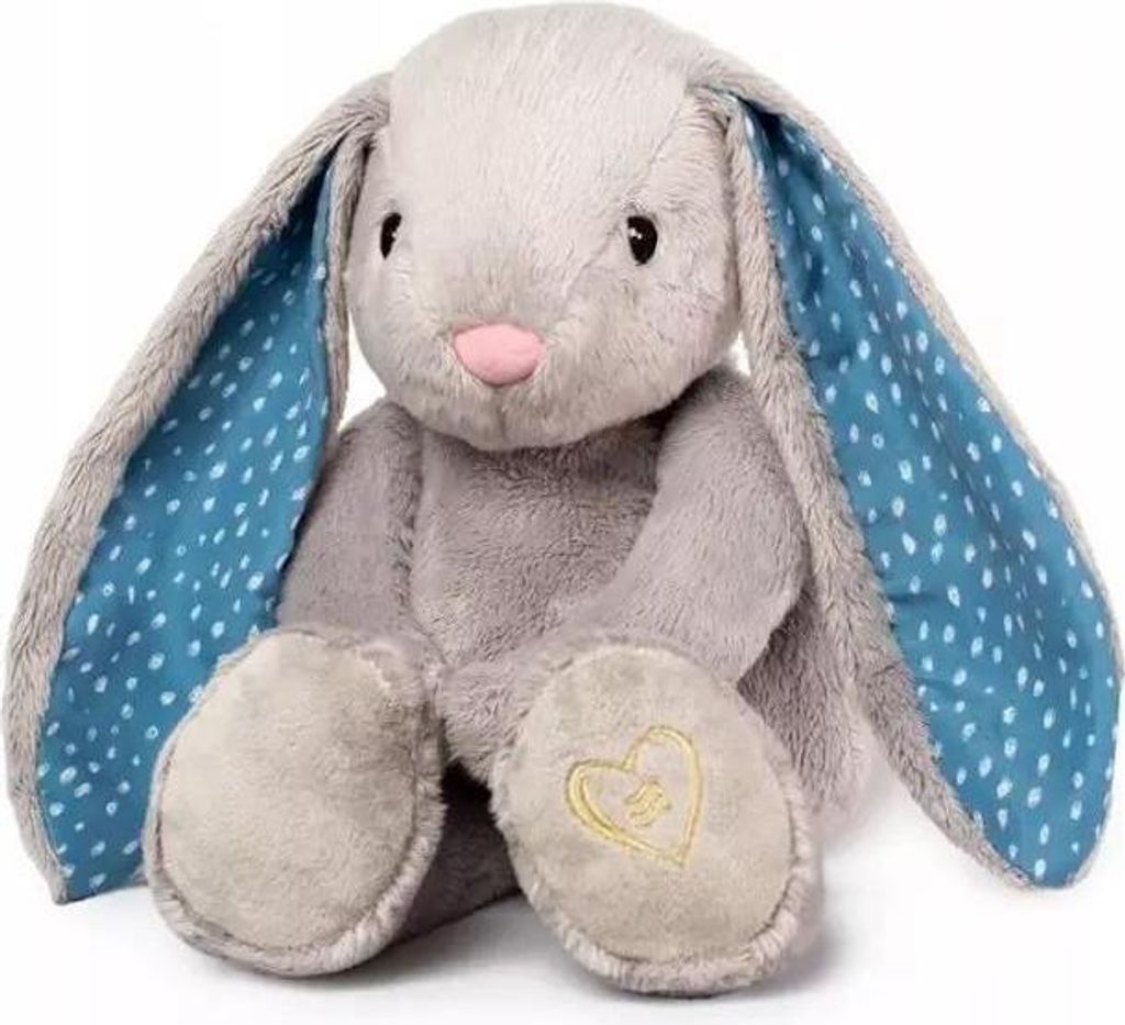 A plush toy bunny is sitting on a white background.